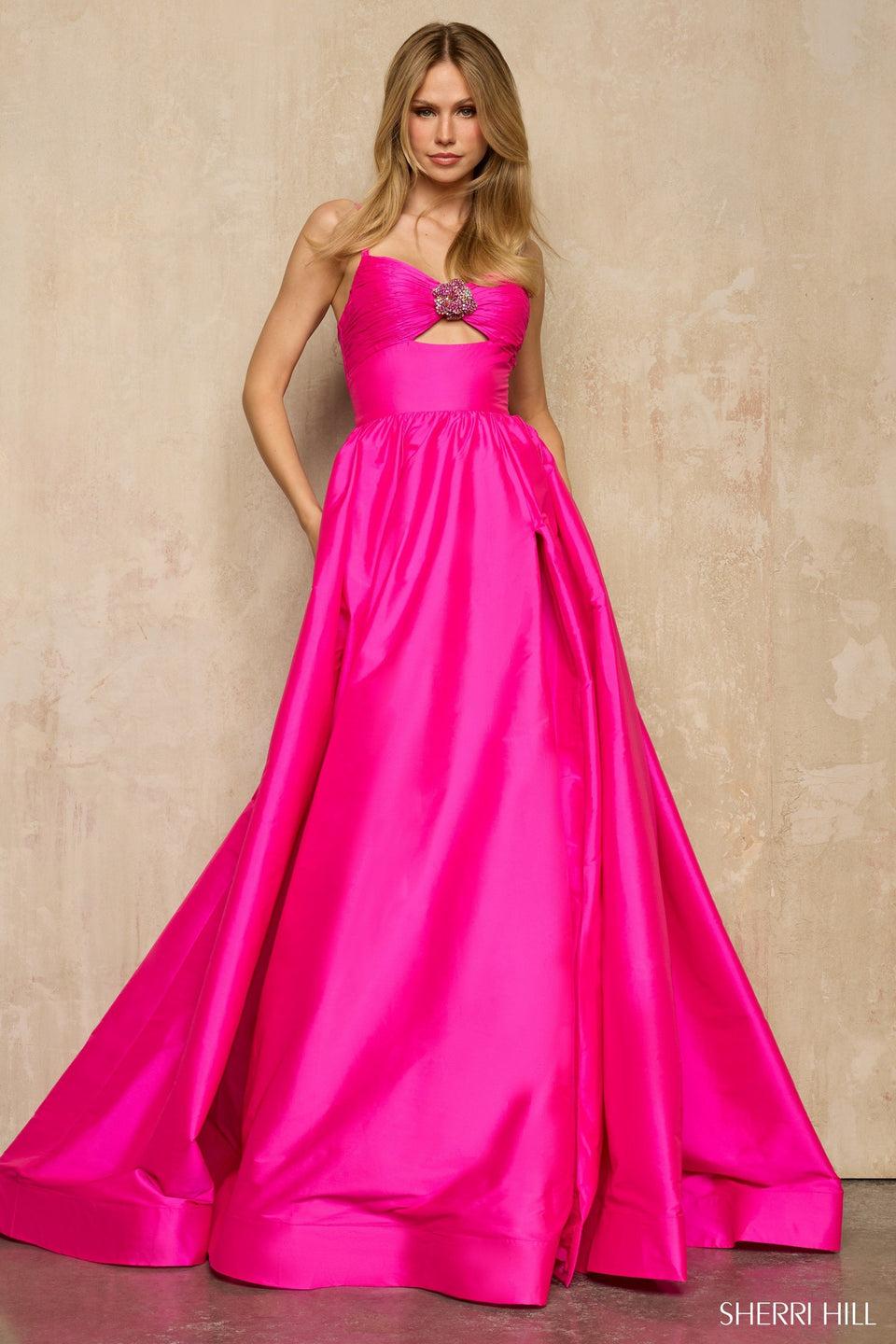 sherri hill A-line gown with a keyhole cutout and beaded floral embellishment