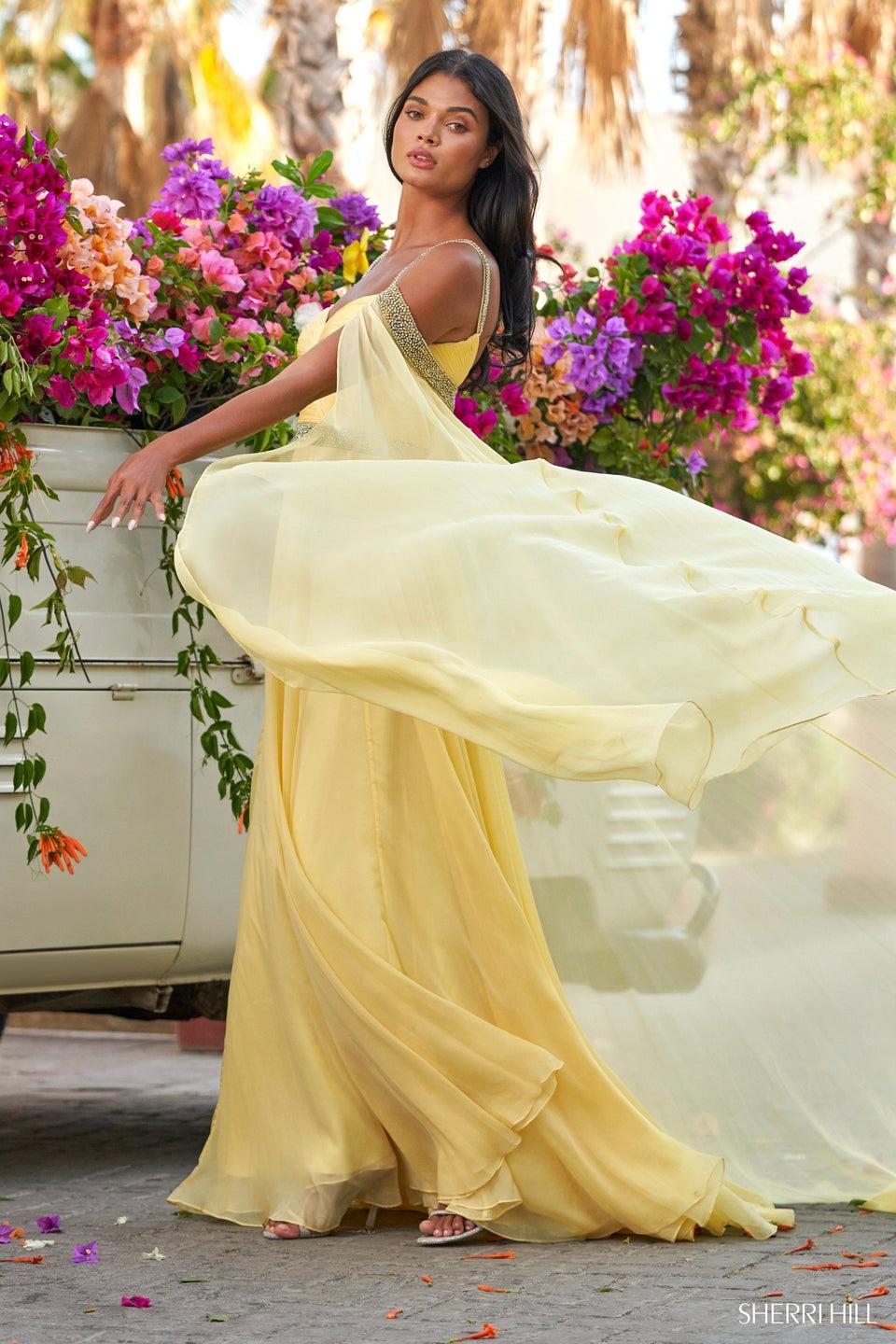sherri hill Chiffon gown with ruched bodice beaded belt and straps and cold shoulder cape