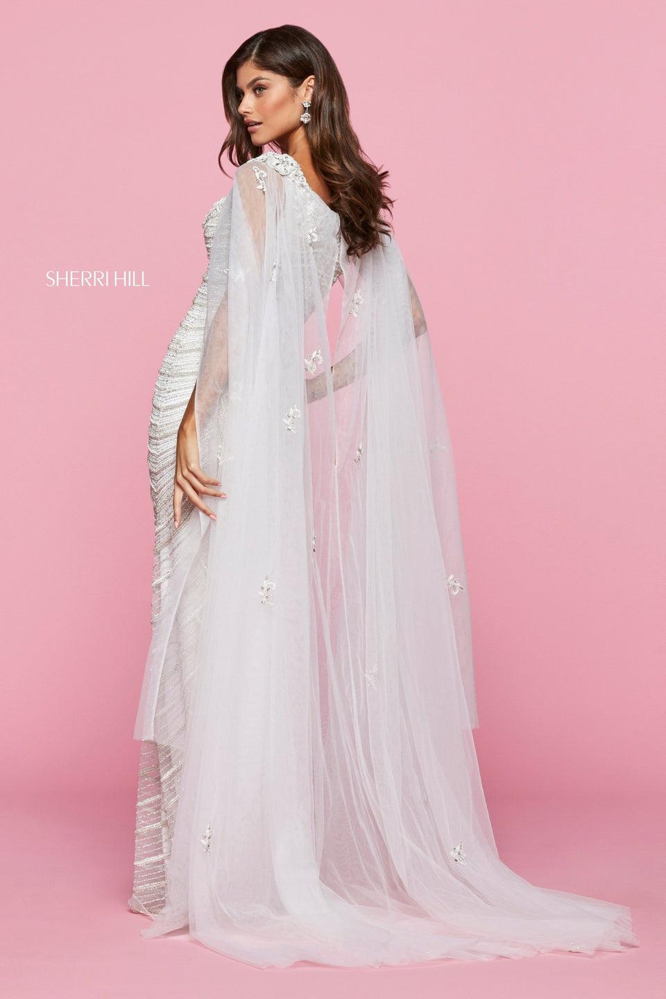 Sherri Hill Fitted Beaded Gown With Embellished V Neckline And Organza Cape With Embroidered Detailing