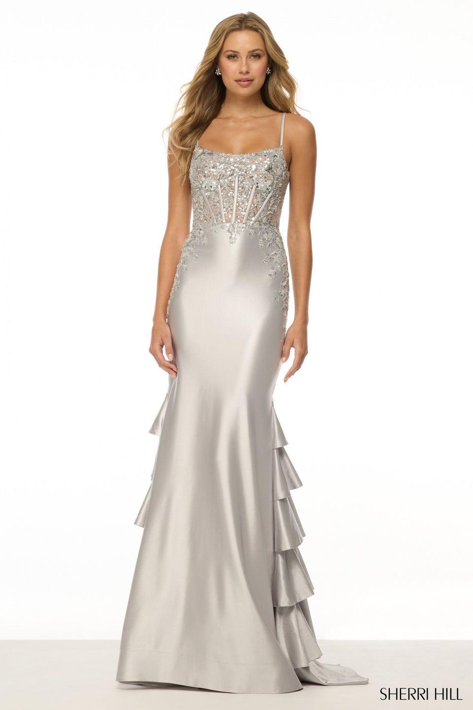 sherri hill Fitted gown with sequin lace corset bodice and ruffle embellished skirt in the back
