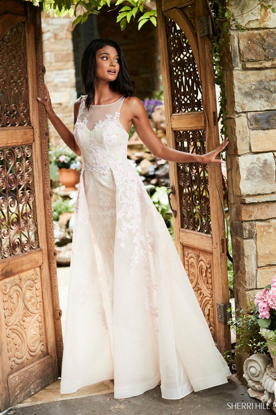 sherri hill Fitted gown with tulle overskirt and flower appliques