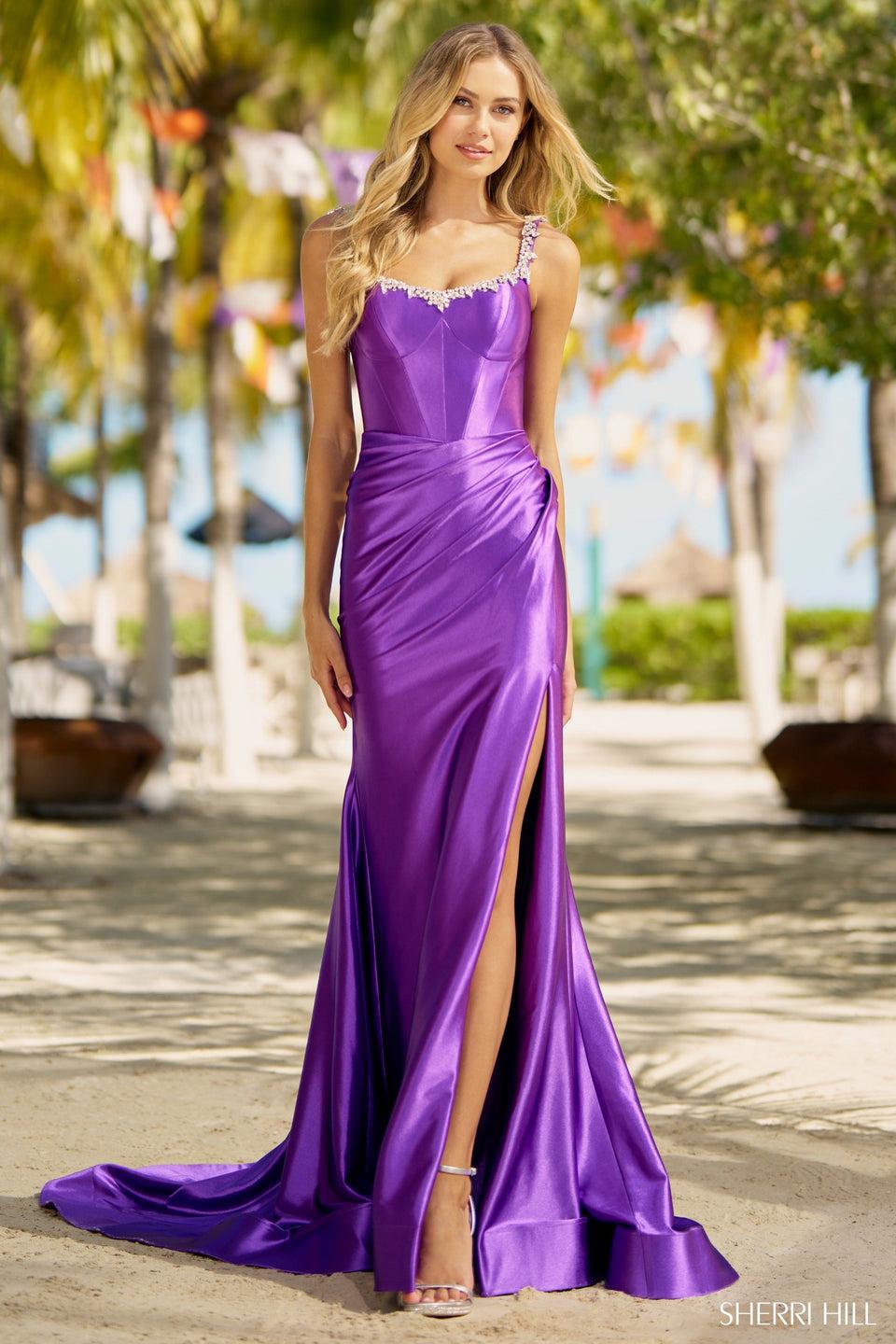 sherri hill Fitted silky stretched satin gown with rhinestone embellished neckline ruched skirt and slit sherri hill Fitted silky stretched satin gown with rhinestone embellished neckline ruched skirt and slit