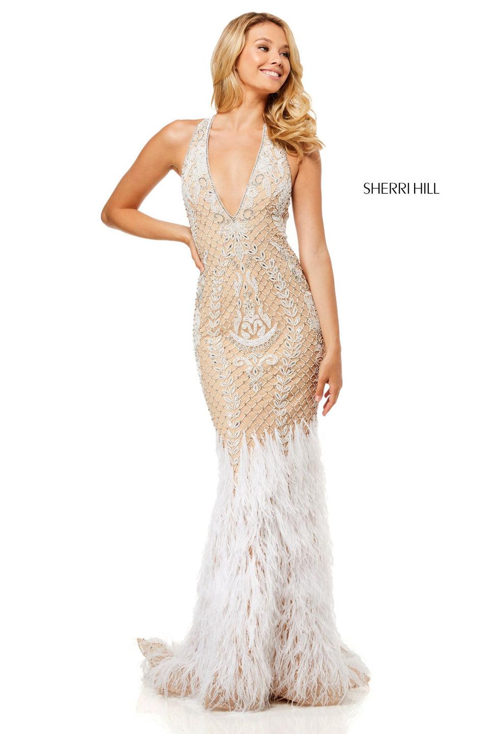Sherri Hill Fully Beaded Gown With A Deep-V Neckline And Keyhole Back With Feather Details On Bottom Of The Skirt