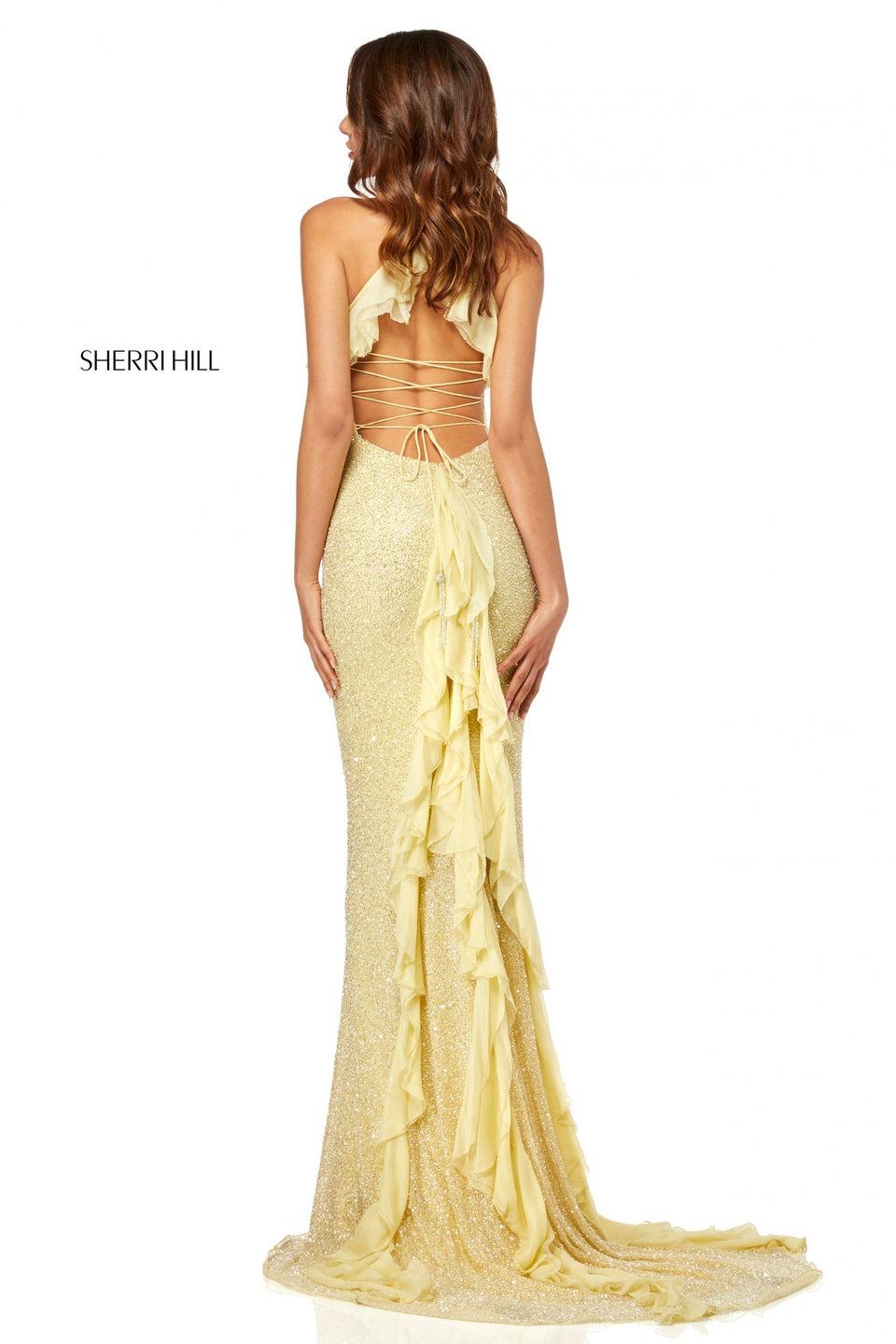 sherri hill Fully beaded gown with chiffon ruffle detail