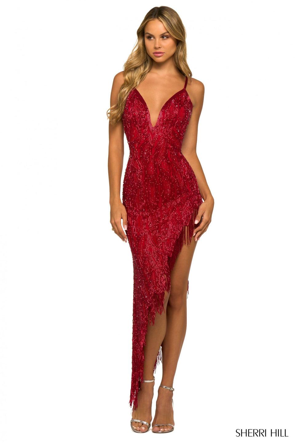 sherri hill Fully beaded gown with plunging deep V neckline and a high slit with fringe embellishments
