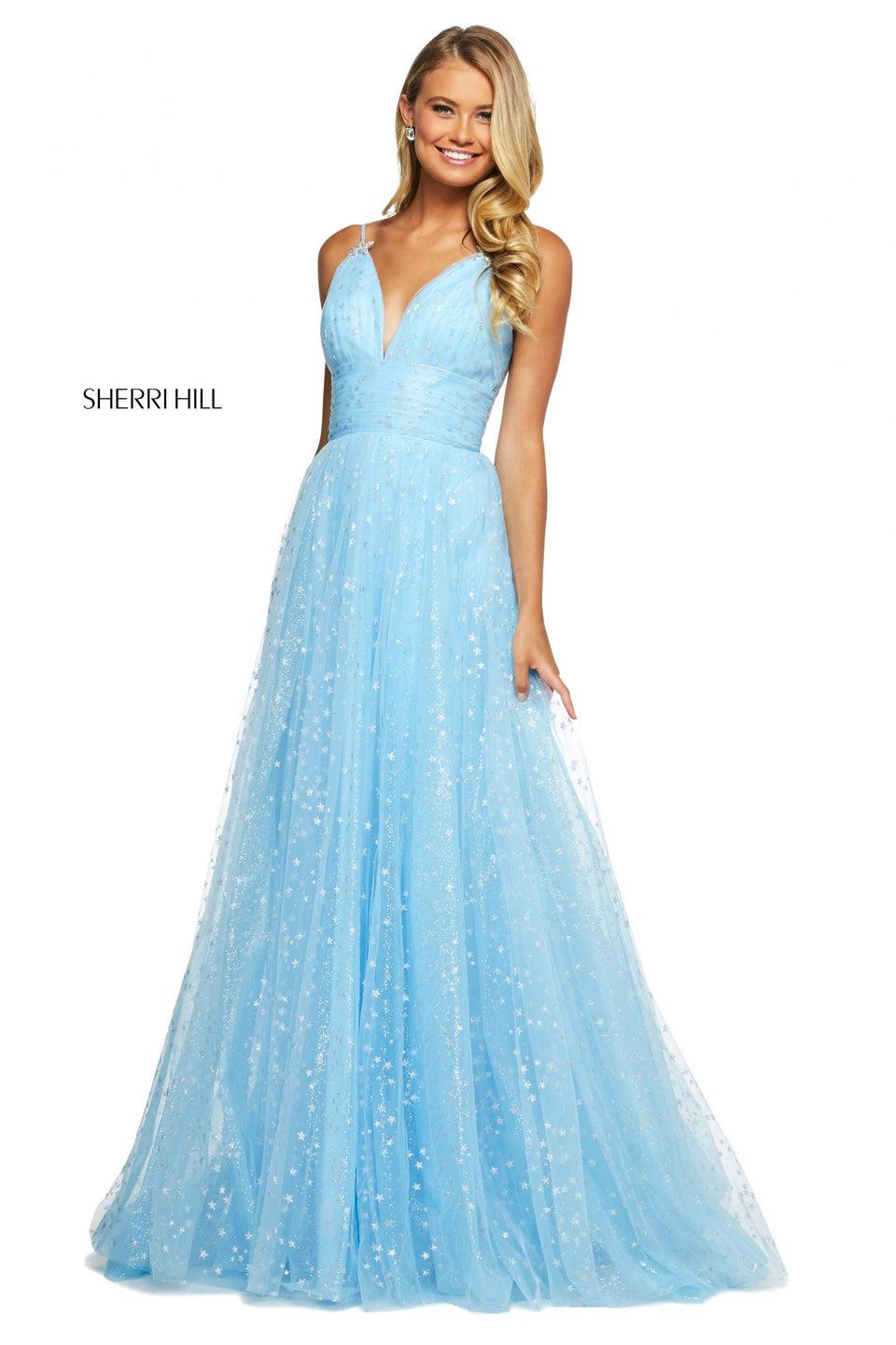 sherri hill Glitter and star print tulle gown with ruched bodice lace up back and jeweled star embellishments on straps