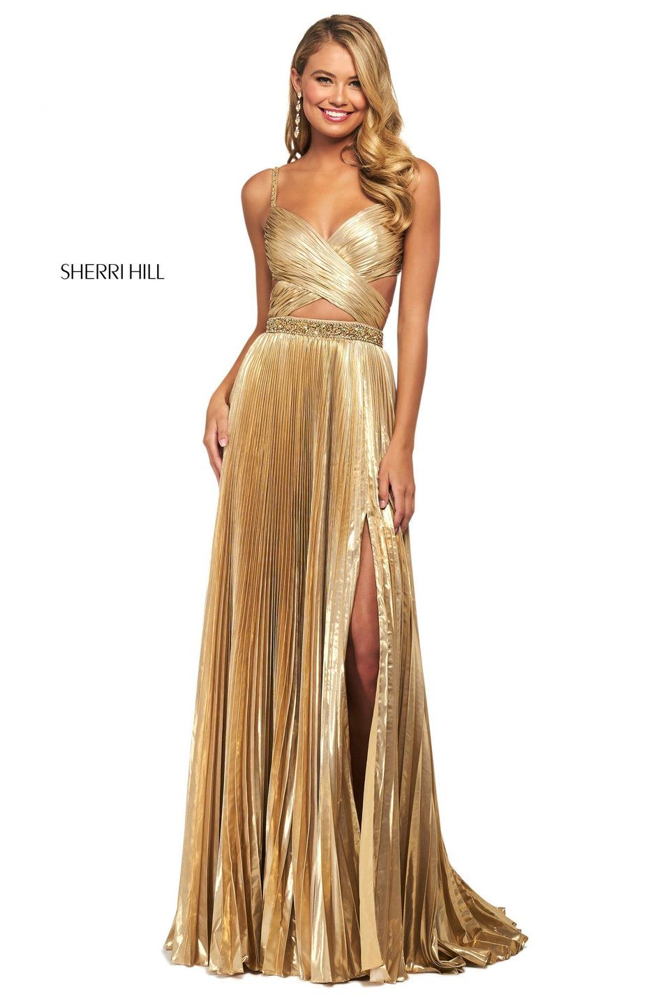 sherri hill Knife pleated lamÃ© gown with ruched criss-cross wrap bodice beaded waistband and straps and skirt slit