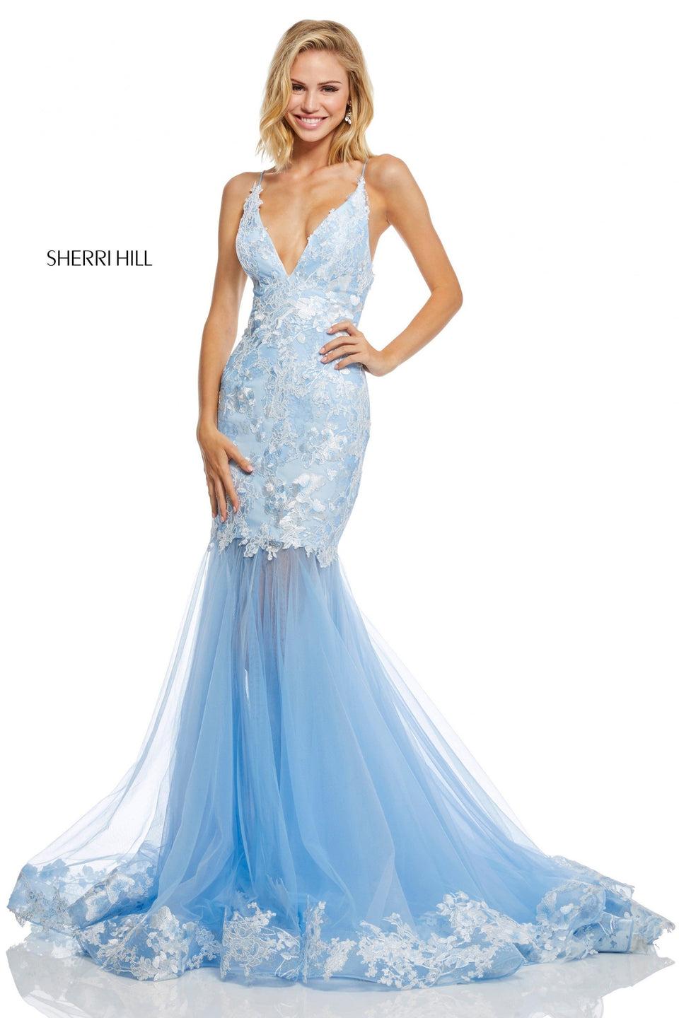 sherri hill Lace and tulle mermaid with deep-V neck lace trim at the hem and criss cross straps in the back sherri hill Lace and tulle mermaid with deep-V neck lace trim at the hem and criss cross straps in the back