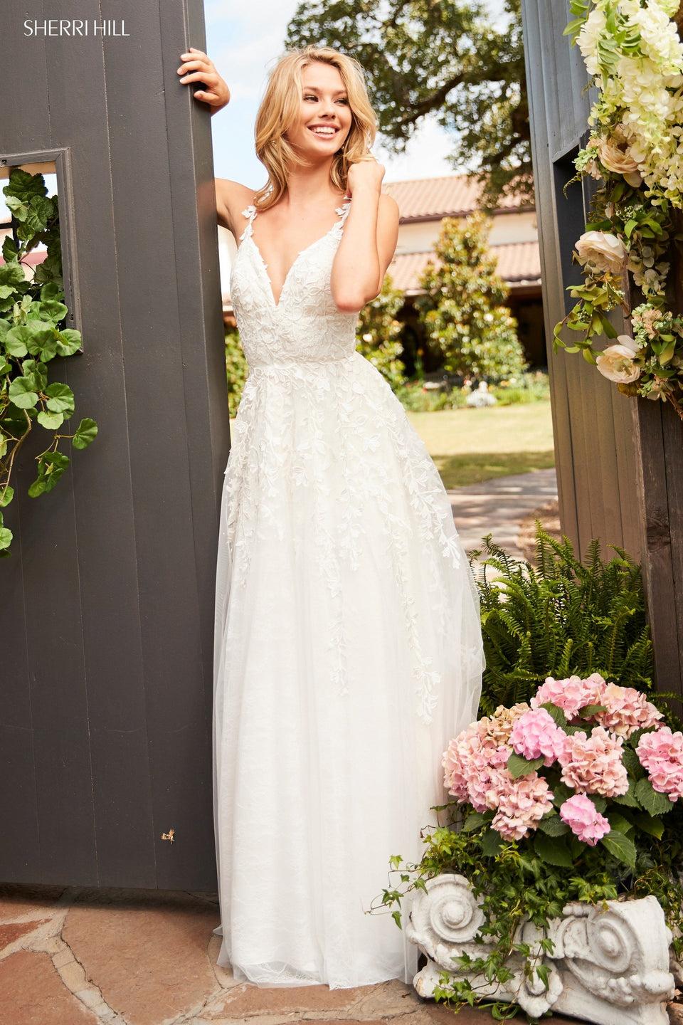 sherri hill Leaf lace appliqued A-line gown with a V sweetheart neckline