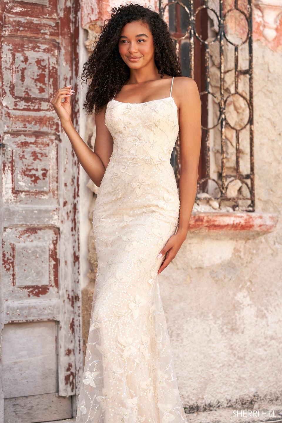 sherri hill Long fitted gown with butterfly sequin embellishments and lace up back