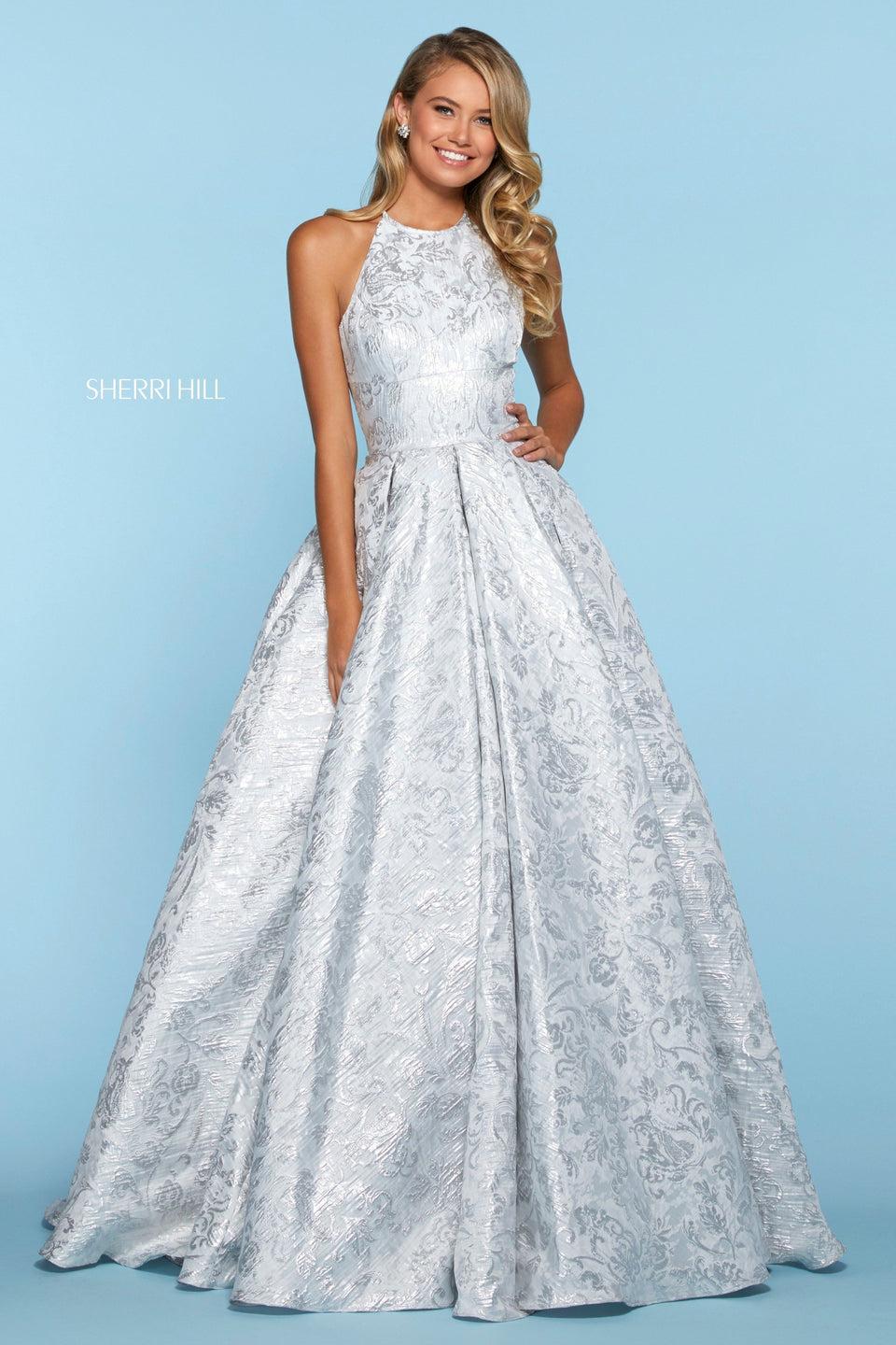 sherri hill Metallic brocade ball gown with halter neckline pockets and corset style lace up back