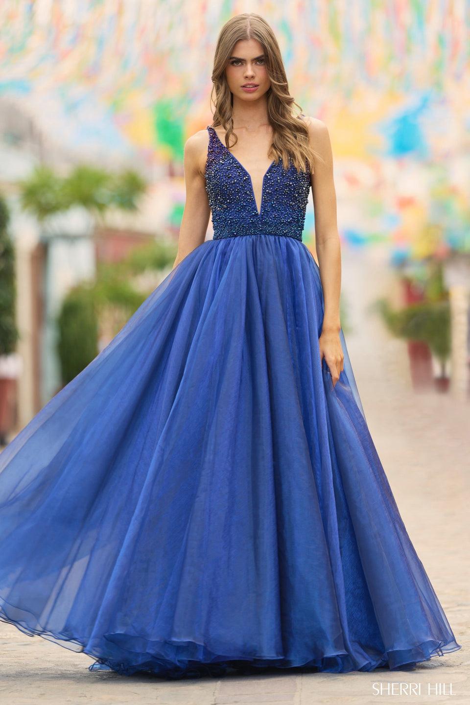 sherri hill Organza ball gown with crystal beaded bodice and deep V-Neckline