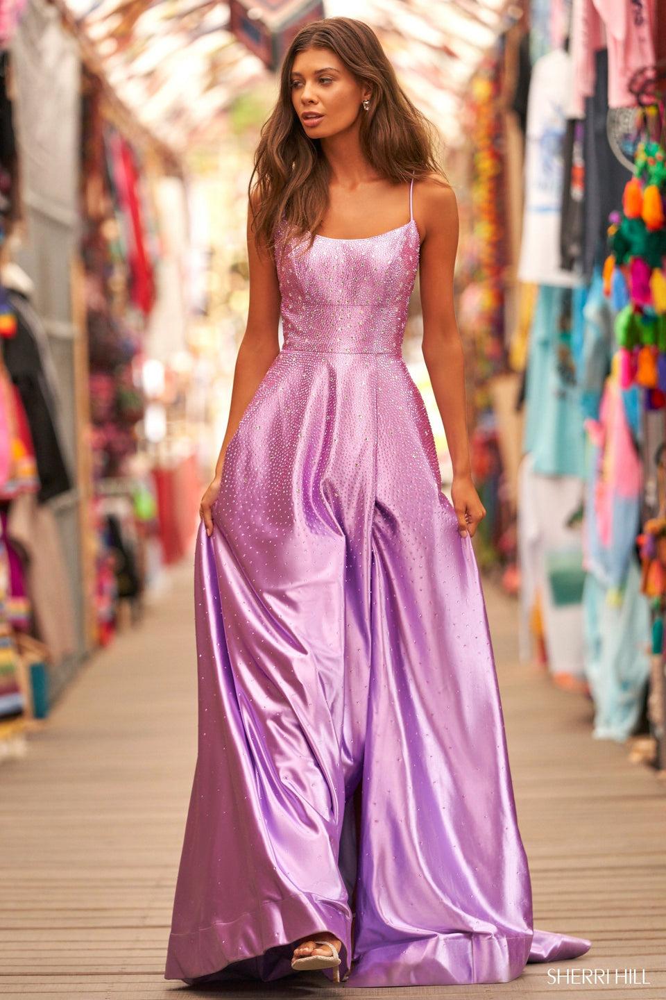 sherri hill Rhinestone jersey ballgown with beaded star details lace up back and skirt slit