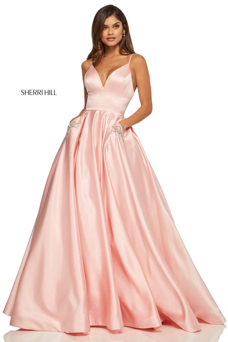 sherri hill Satin ball gown with deep-V neckline and beaded bow shape pocket detailing