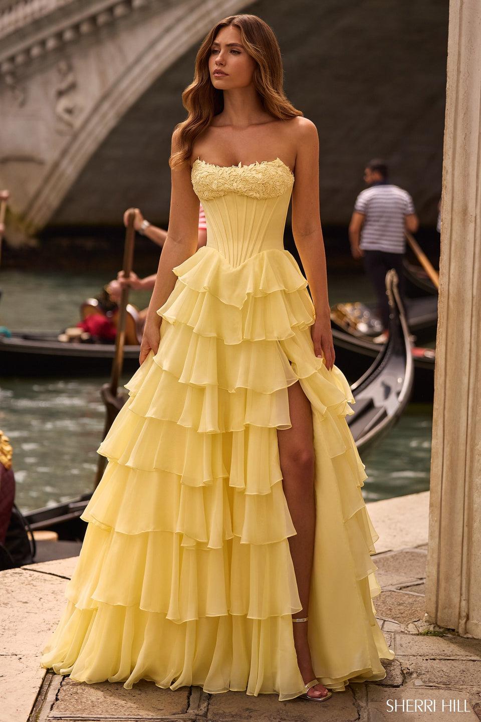 sherri hill Strapless ballgown with corset bodice and chiffon ruffle skirt with slit