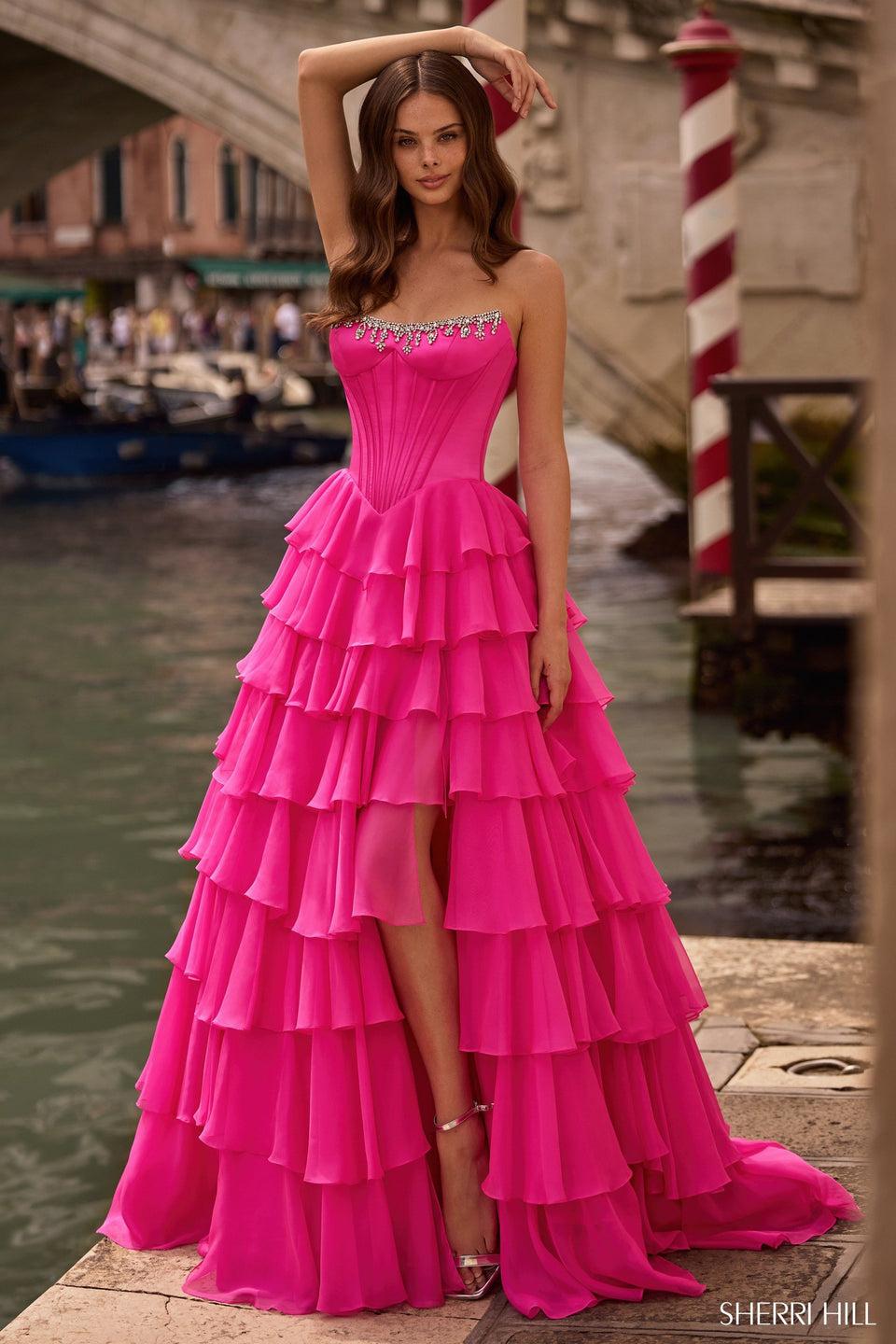 sherri hill Strapless ballgown with corset bodice chiffon ruffle skirt with slit and bead embellishments sherri hill Strapless ballgown with corset bodice chiffon ruffle skirt with slit and bead embellishments