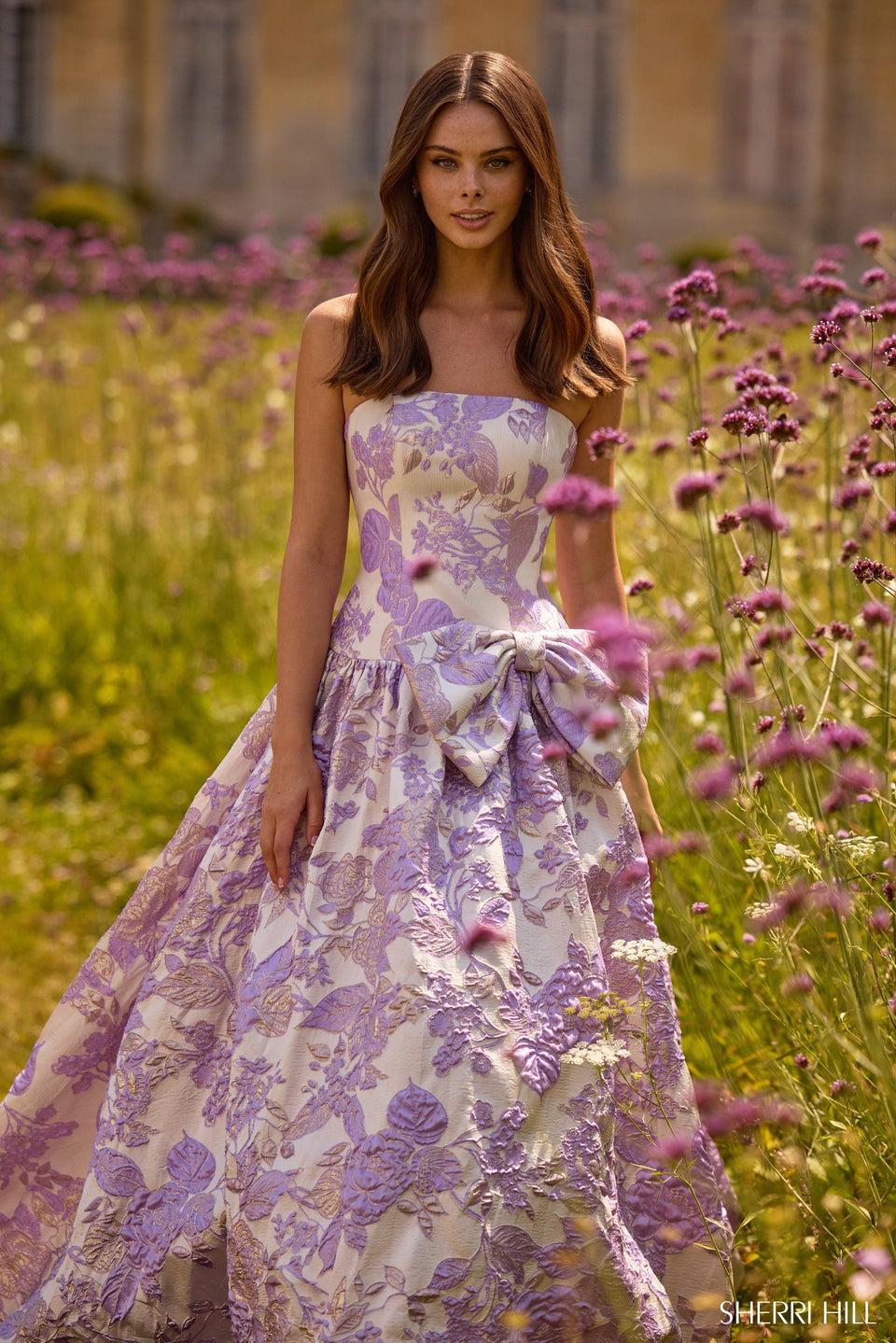 sherri hill Strapless brocade ballgown with bow on waist