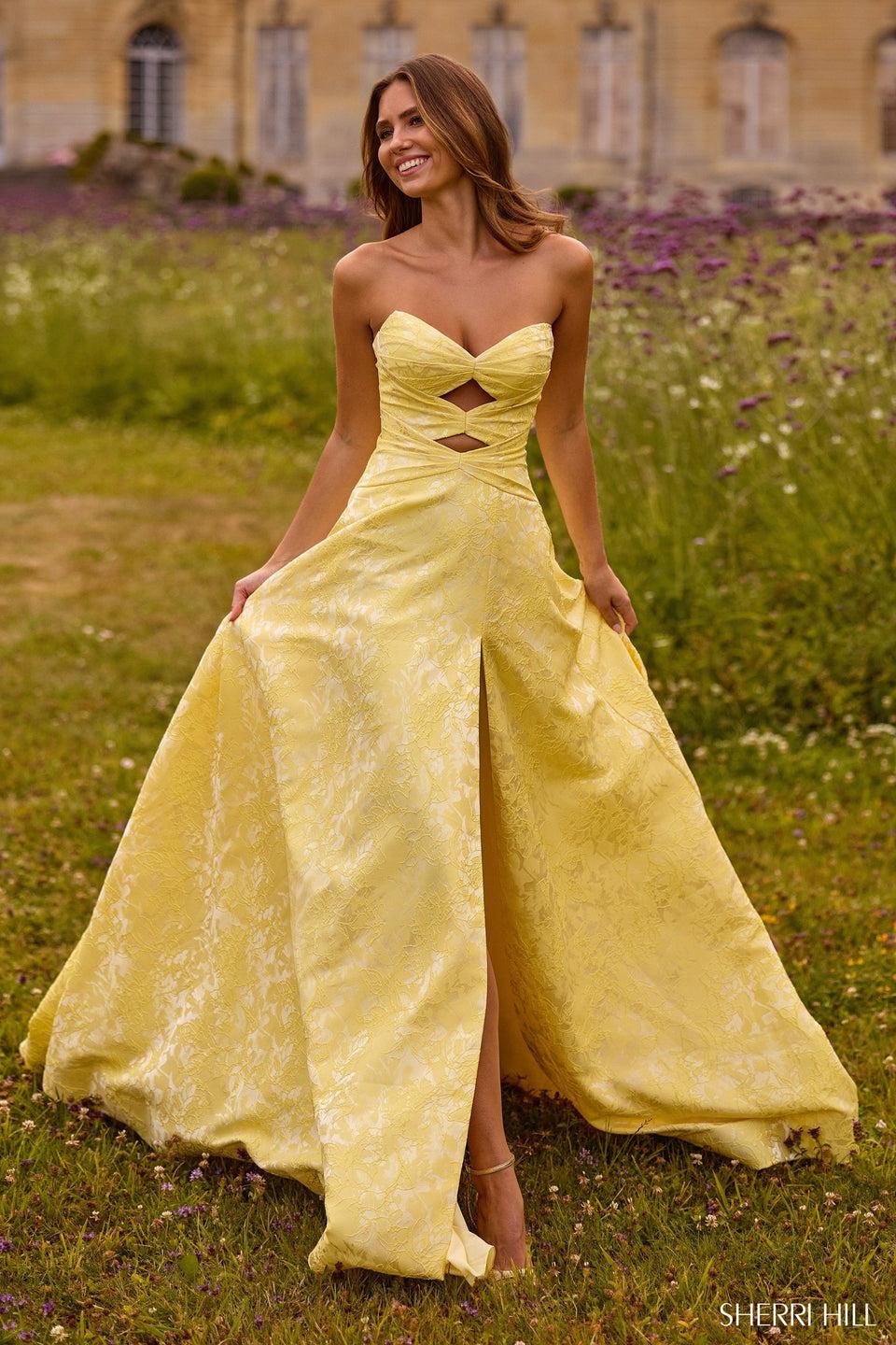 sherri hill Strapless brocade gown with keyholes and a skirt slit