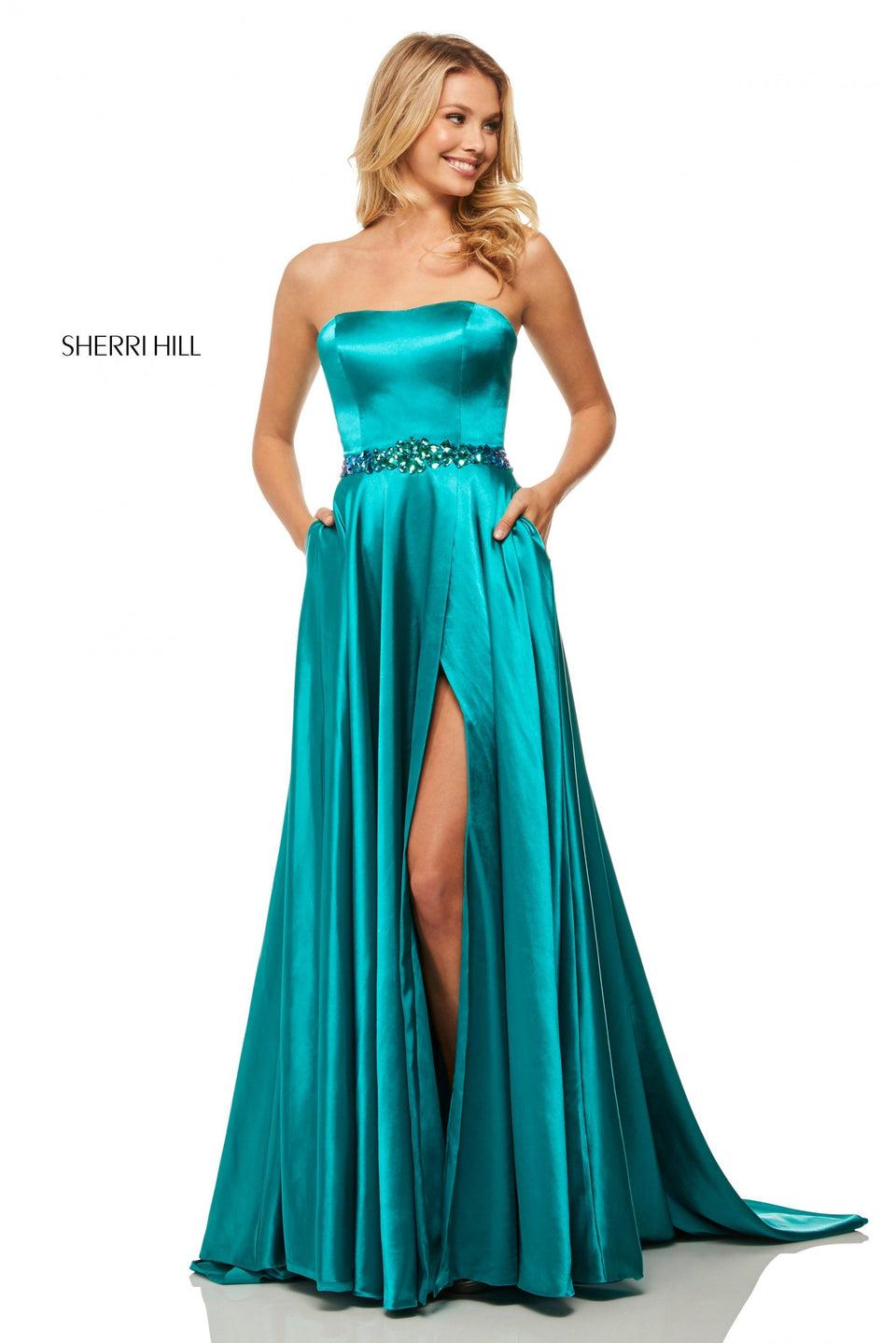 sherri hill Strapless charmeuse gown with a beaded waistband and a slit