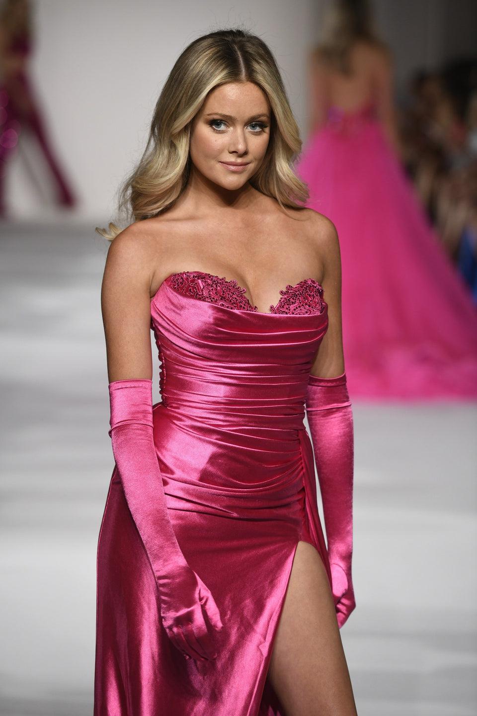 sherri hill Strapless corset gown with ruched bodice high slit and side overskirt. Gloves not included sherri hill Strapless corset gown with ruched bodice high slit and side overskirt. Gloves not included