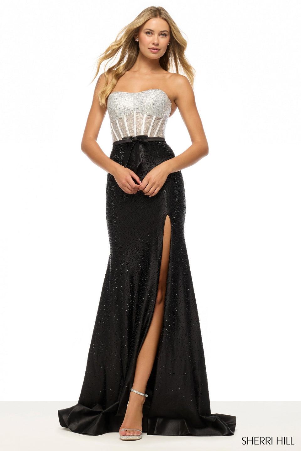 sherri hill Strapless fitted hot fix gown with corset bodice skirt slit and a bow