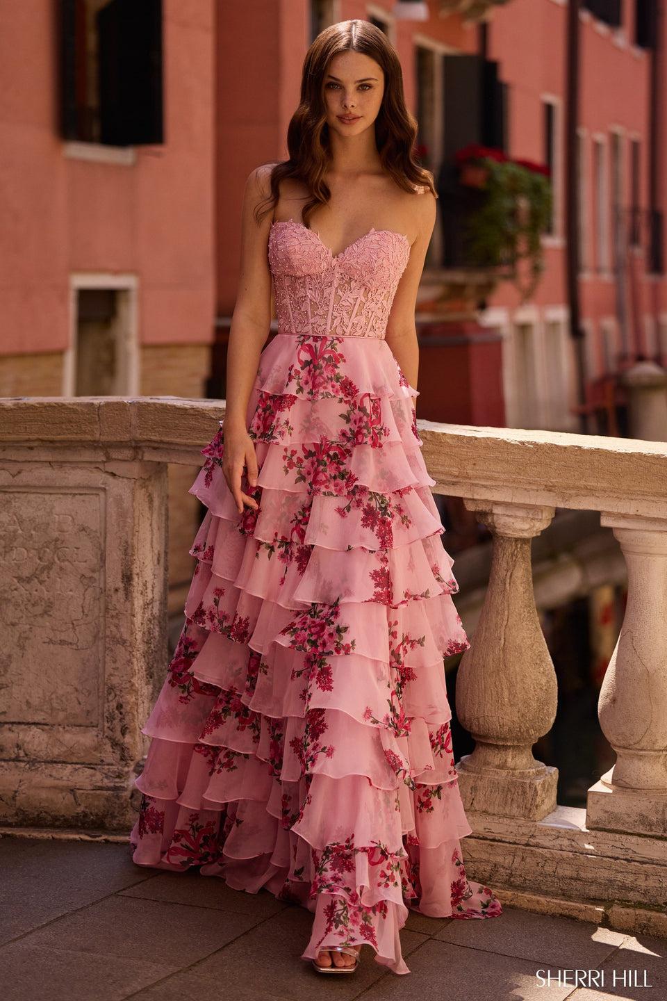 sherri hill Strapless floral gown with leaf lace corset bodice and a ruffle skirt with slit