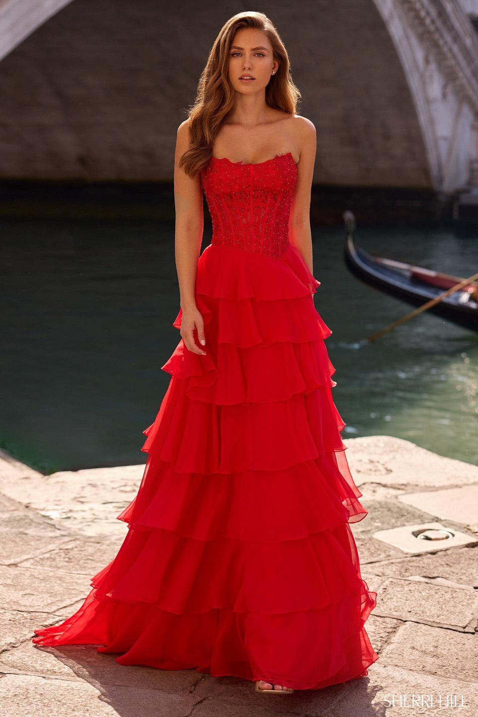 sherri hill Strapless gown with leaf lace corset bodice and chiffon ruffle skirt with slit