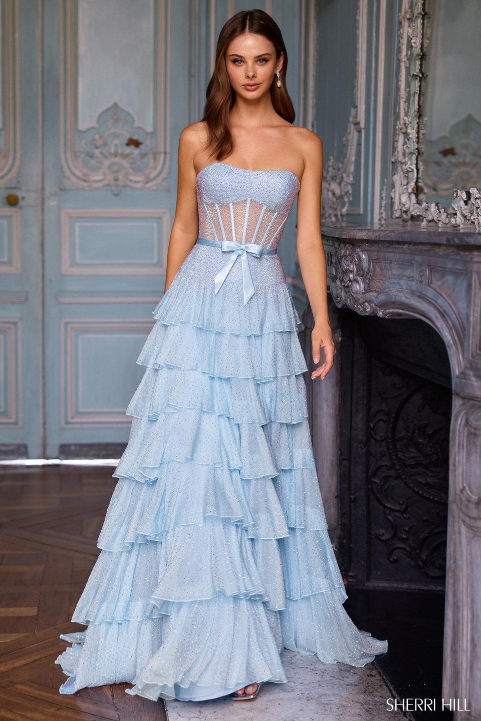 sherri hill Strapless hot fix A-line gown with drop-waist corset bodice bow and a ruffle skirt with a slit