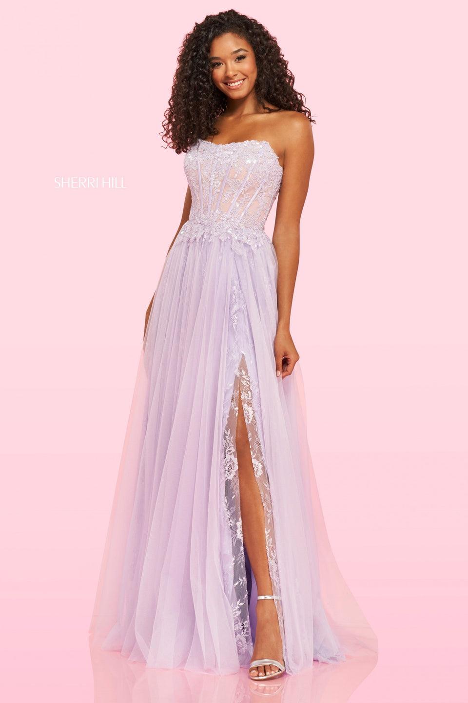 sherri hill Strapless lace embroidered boned bodice with a lace under skirt and tulle over slit skirt