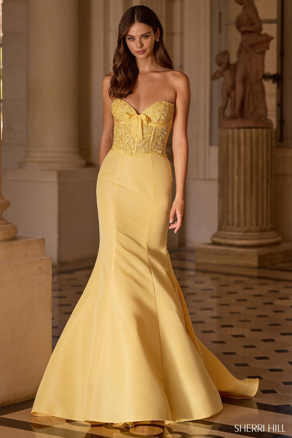 sherri hill Strapless mermaid gown with lace corset bodice and a taffeta skirt