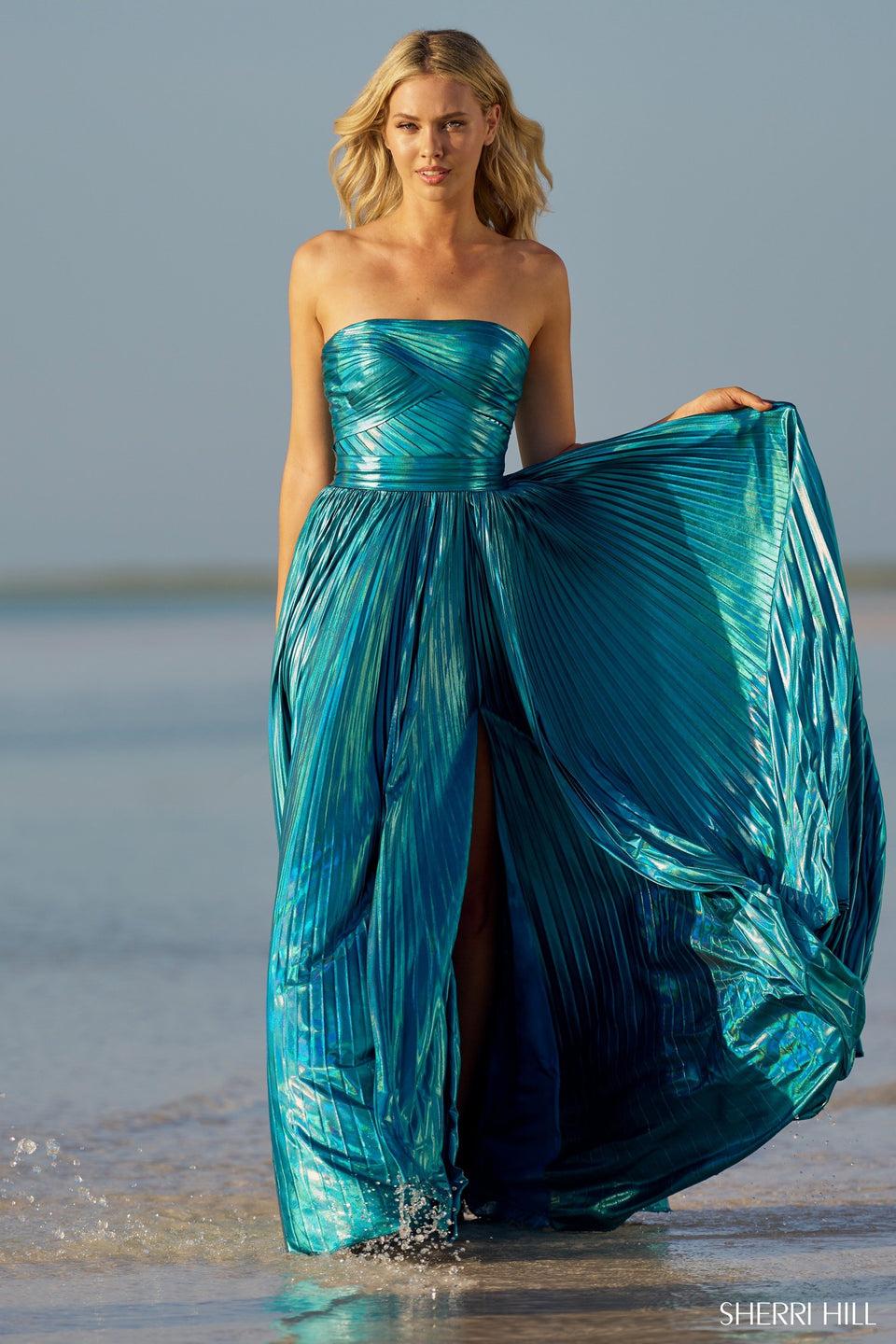 sherri hill Strapless metallic A-line gown with pleaded skirt and slit sherri hill Strapless metallic A-line gown with pleaded skirt and slit