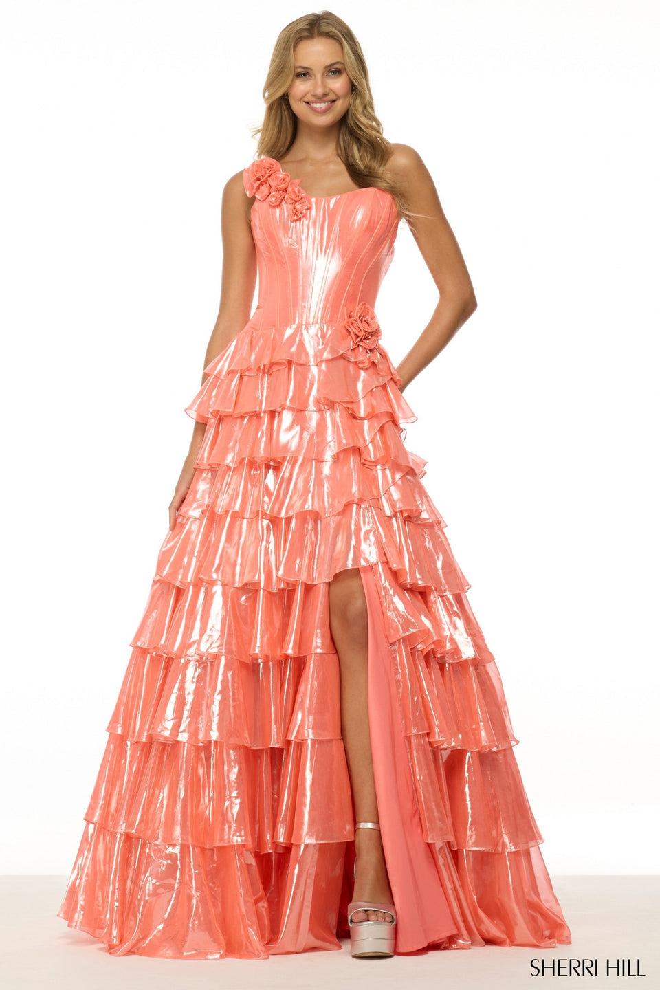 Sherri Hill Strapless Metallic Ballgown With Rosette Embellishments And A Ruffle Skirt With Slit