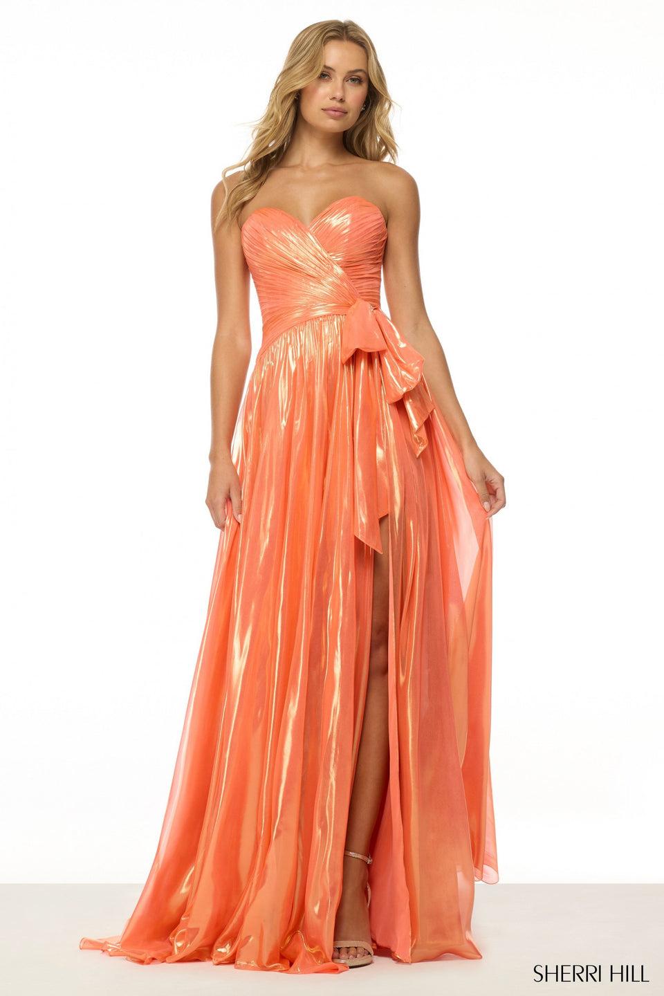 Sherri Hill Strapless Metallic Gown With Skirt Slit And A Bow