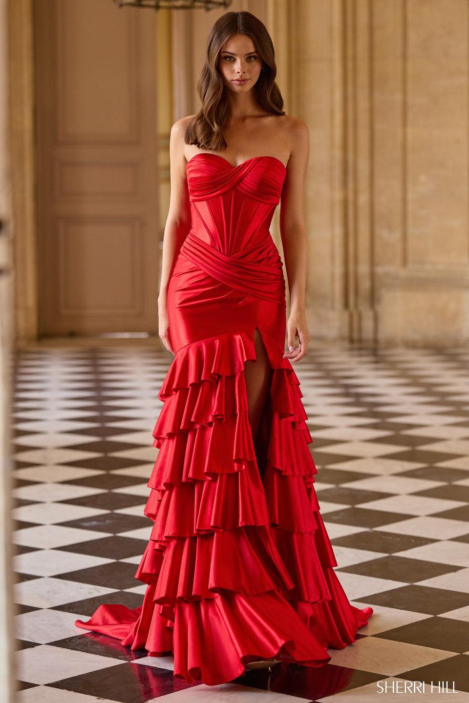 sherri hill Strapless stretch satin mermaid gown with corset bodice and a ruffle skirt with slit