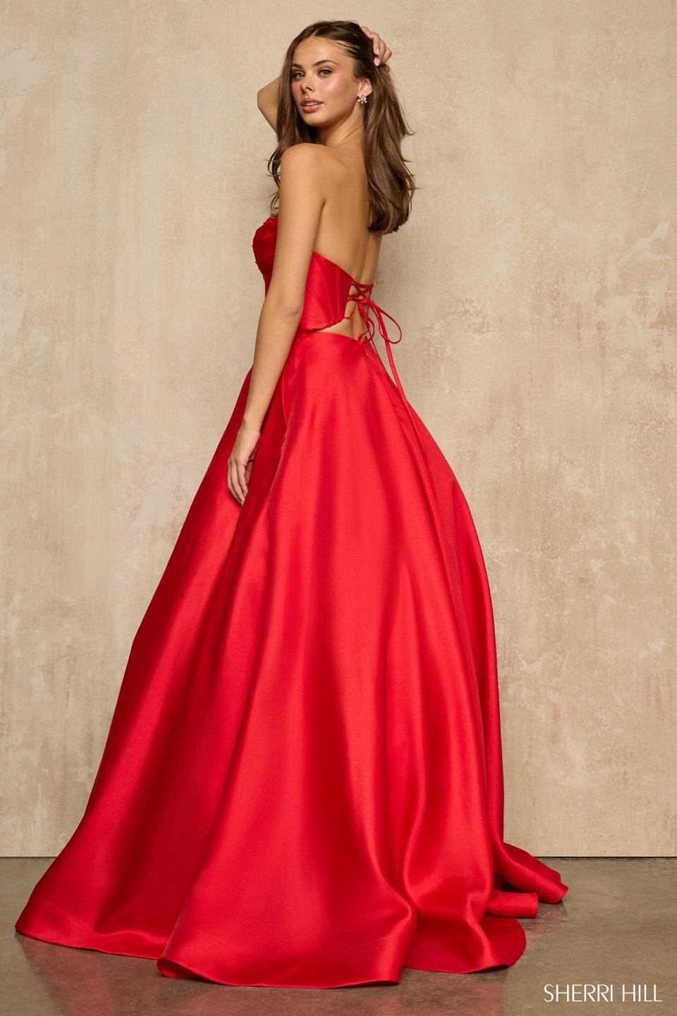 Sherri Hill Strapless V Neck Ballgown With A Corset And Basque Waist