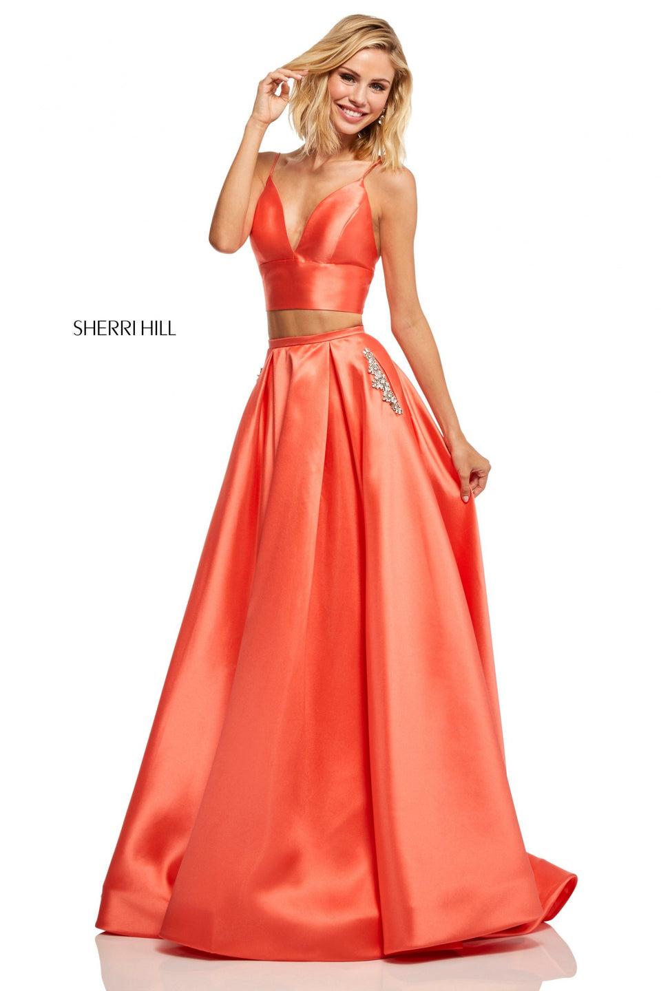 sherri hill Two-piece A-line with deep-V neckline top with spaghetti straps and an A-line skirt with jewel encrusted pockets