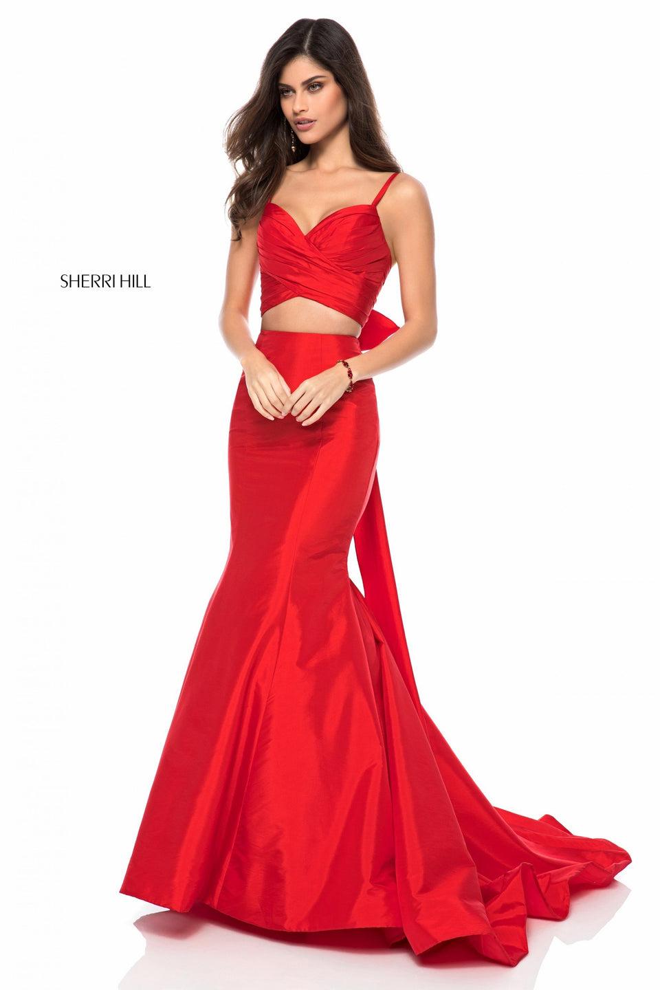sherri hill Two piece mermaid gown with a criss cross sweetheart neck and a bow in the back