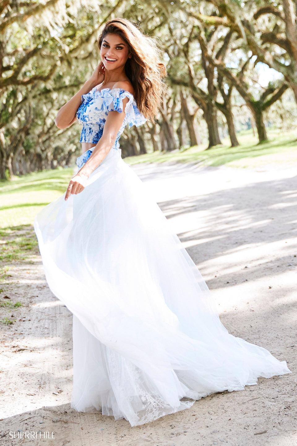 sherri hill Two-piece smocked off-the-shoulder printed top with ruffle neckline and tulle A-line skirt with bow