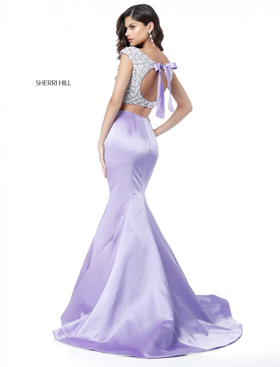 sherri hill Two piece with beaded and pearl encrusted bodice with a cut out in the back and a satin mermaid skirt