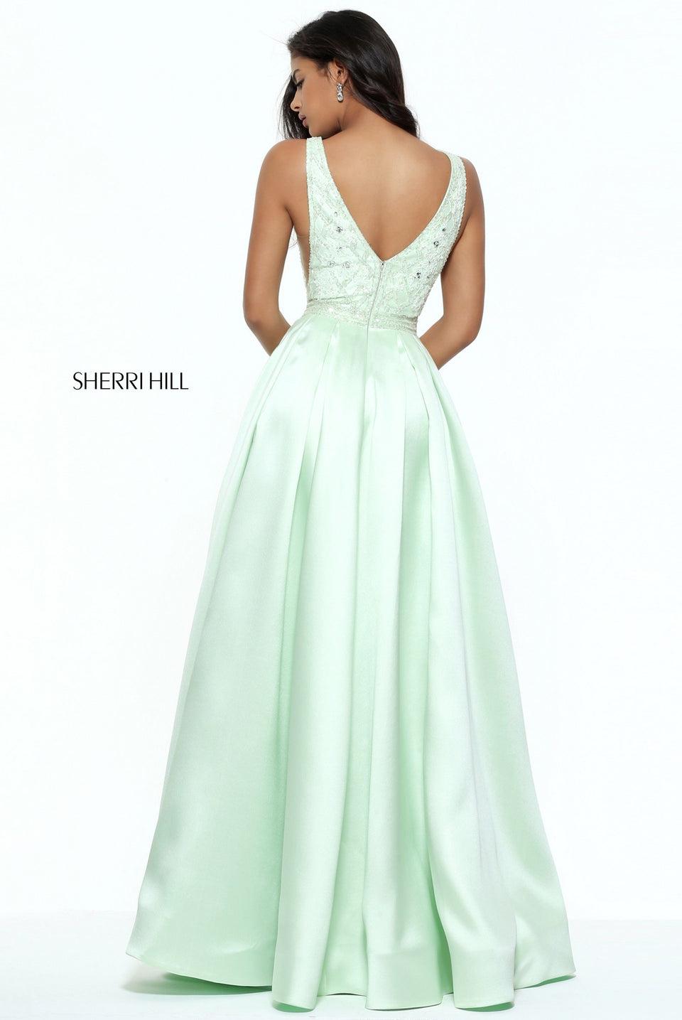 Sherri Hill V-neck Ball Gown With A Beaded Bodice And Sheer Sides